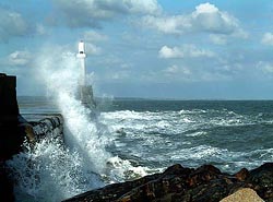 Stormy North Sea batters Aberdeens South Pier in action photo